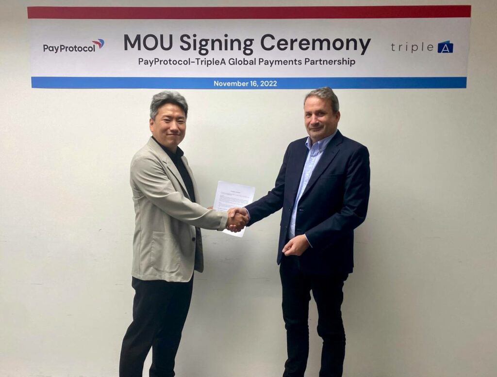 Picture depicting the MOU signing ceremony between PayProtocol and TripleA